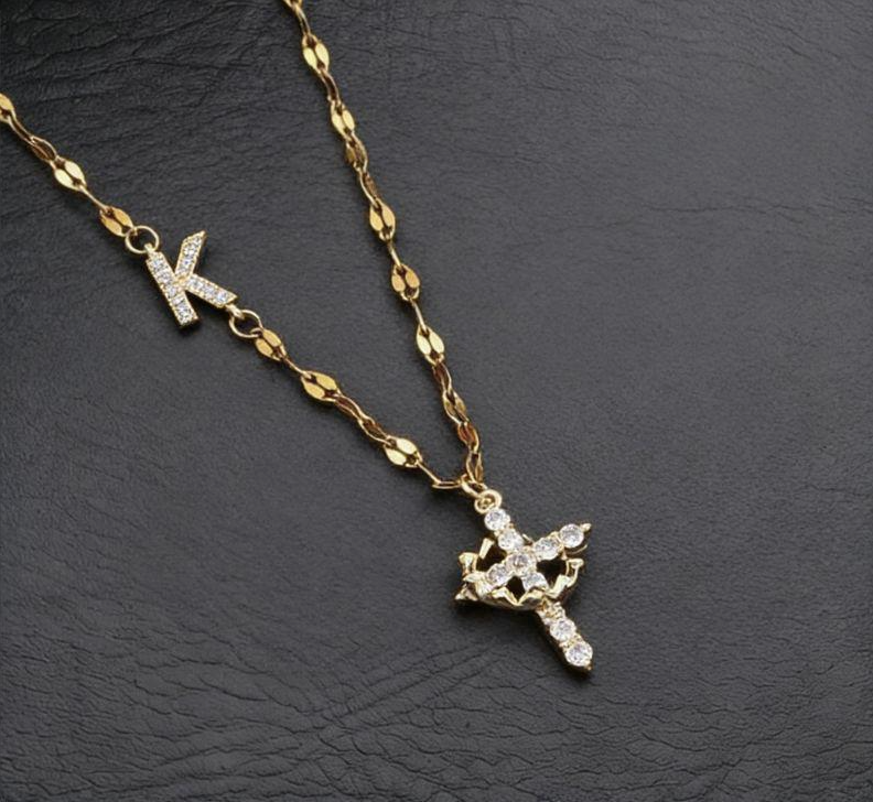 Rotating Letter Cross Necklace